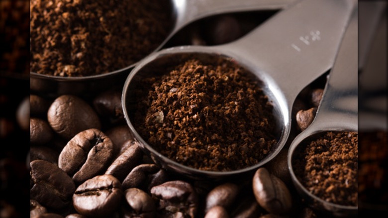 scoop with ground coffee