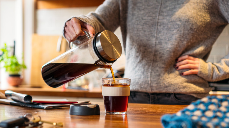 pouring cold brew coffee