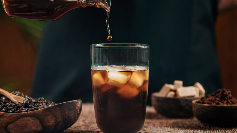 pouring cold brew coffee