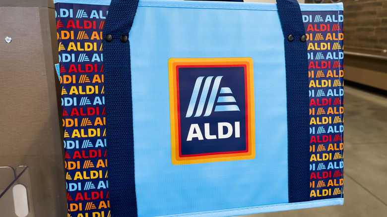Closeup Aldi reusable shopping bag inside store