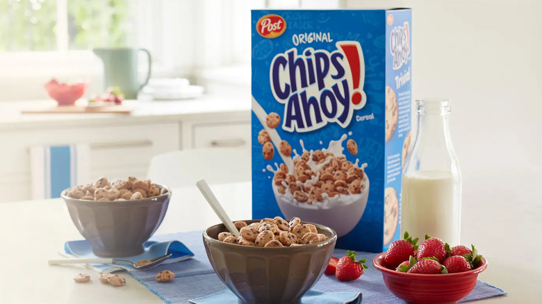 Breakfast table laid with bowls and box of Chips Ahoy! cereal