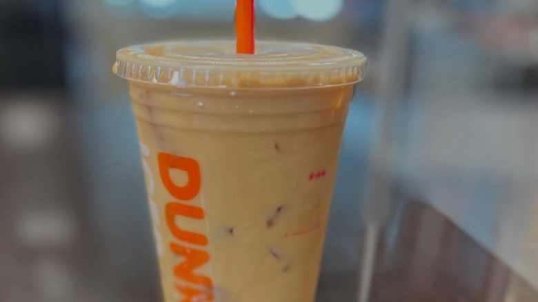 Plastic cup of French Vanilla iced coffee from Dunkin