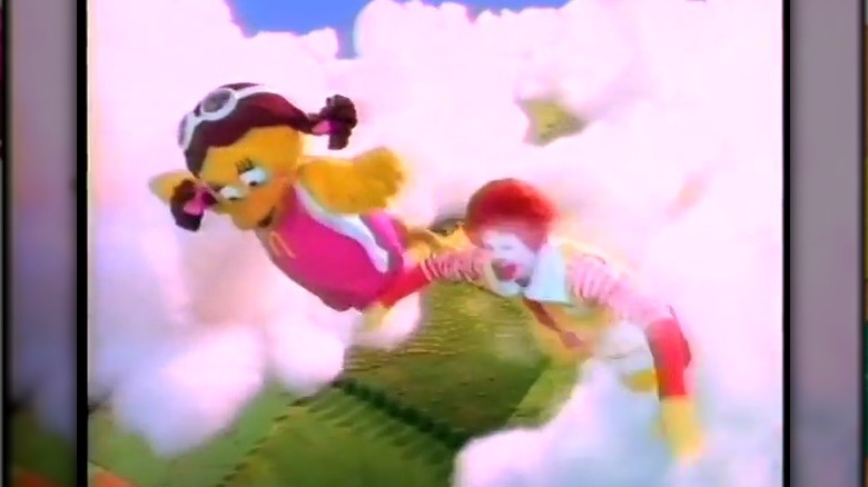 Still from commercial featuring Birdie the Early Bird and Ronald McDonald