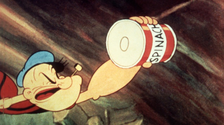 still of popeye the sailor with can of spinach