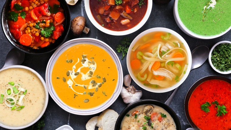 An overhead view of bowls of winter soups