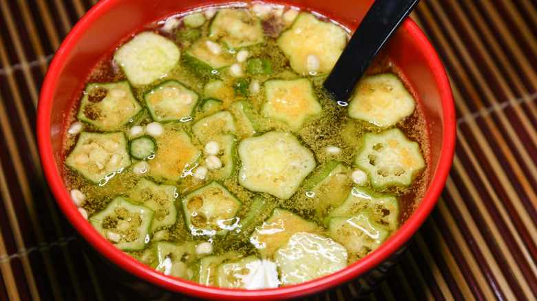 A bowl of mixed vegetable soup using okra