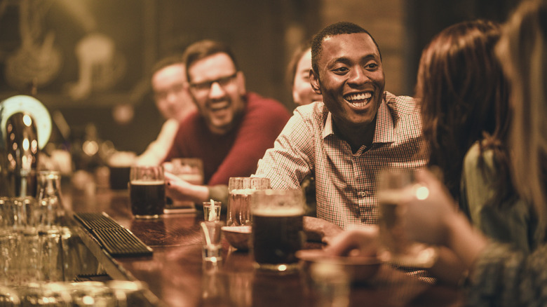 people sitting at a bar