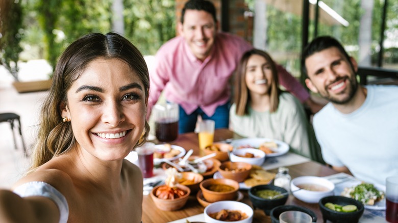 taking a selfie at a restaurant