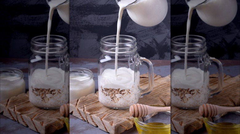 adding ingredients to make overnight oats