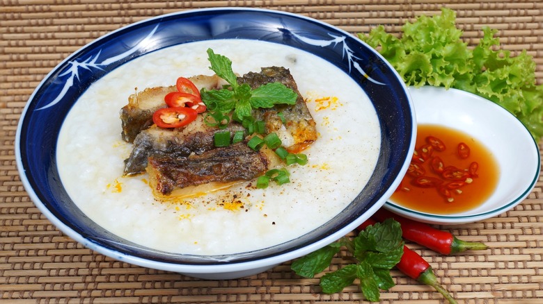 rice porridge with meat, herbs, and fish sauce