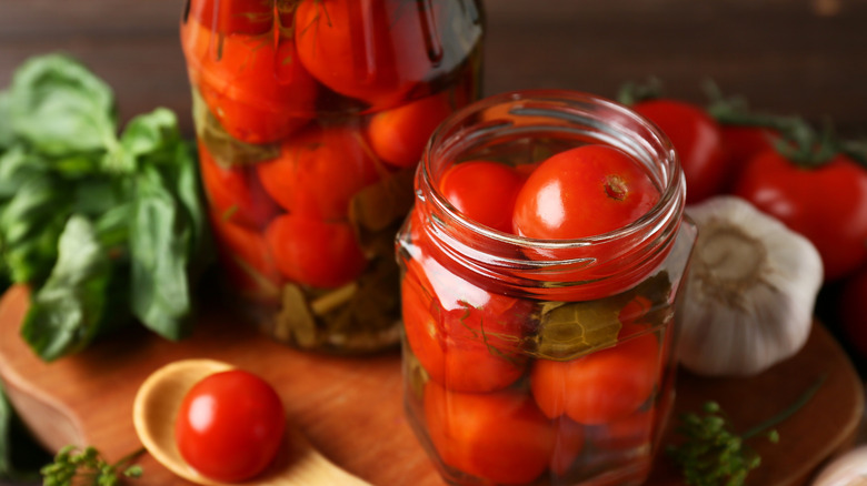 Jars of canned tomatoes