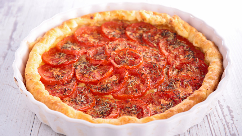 Tomato tart in white dish