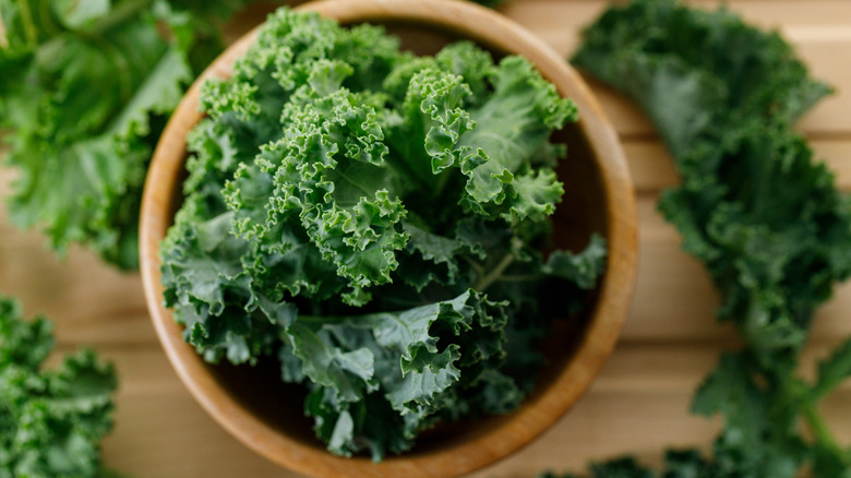Kale in a wooden bowl