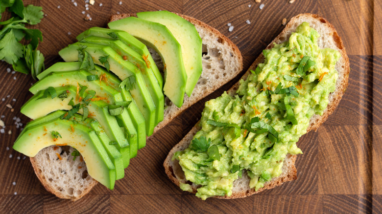 Two sourdough bread toast with avocado topping