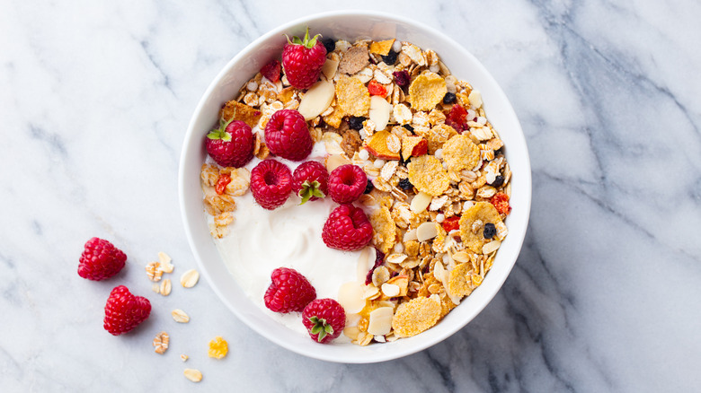 Granola, muesli, and raspberries