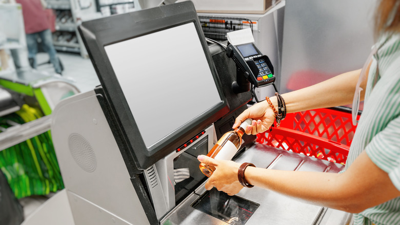 scanning wine at register