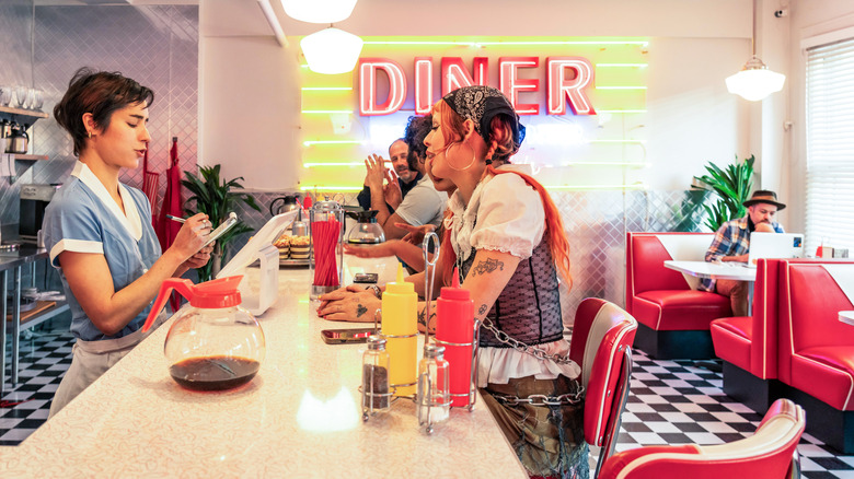 Server at a diner taking orders