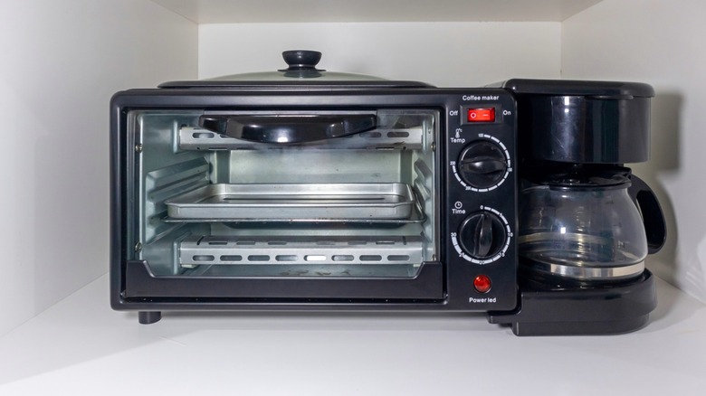 toaster oven in cabinet with coffee maker