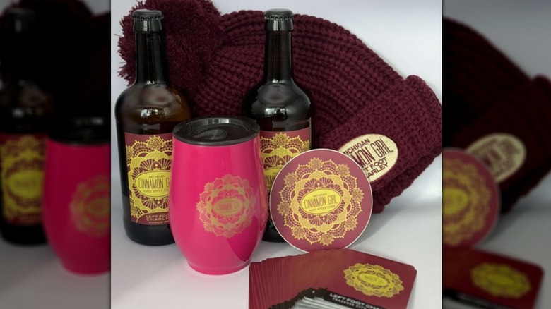 Cinnamon Girl hard cider and merch, from Left Foot Charley