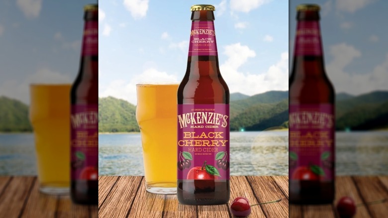 A bottle and glass of Black Cherry from McKenzie's Hard Cider