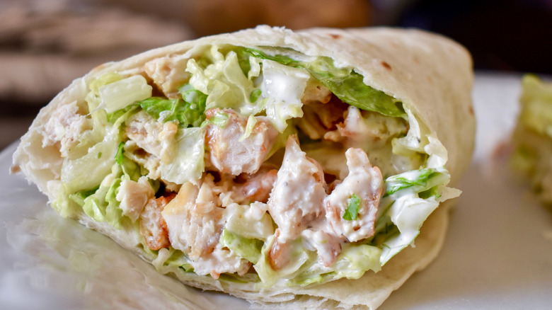 Close up of chicken Caesar salad wrap