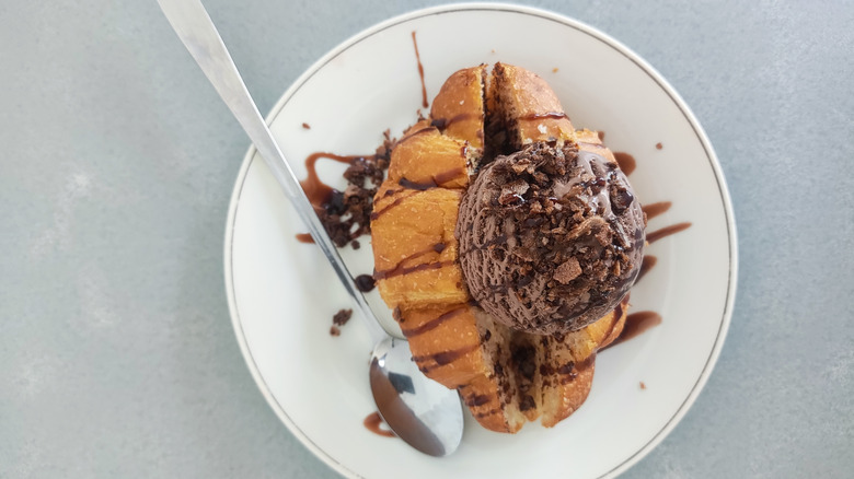Croissant with scoop of ice cream