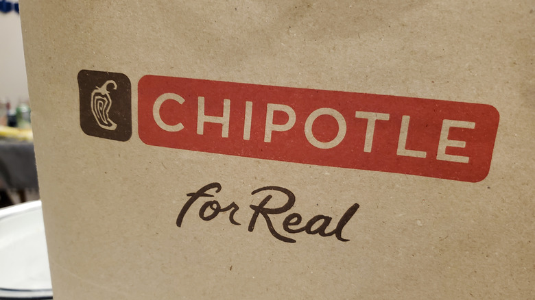 Closeup of branded Chipotle paper bag.