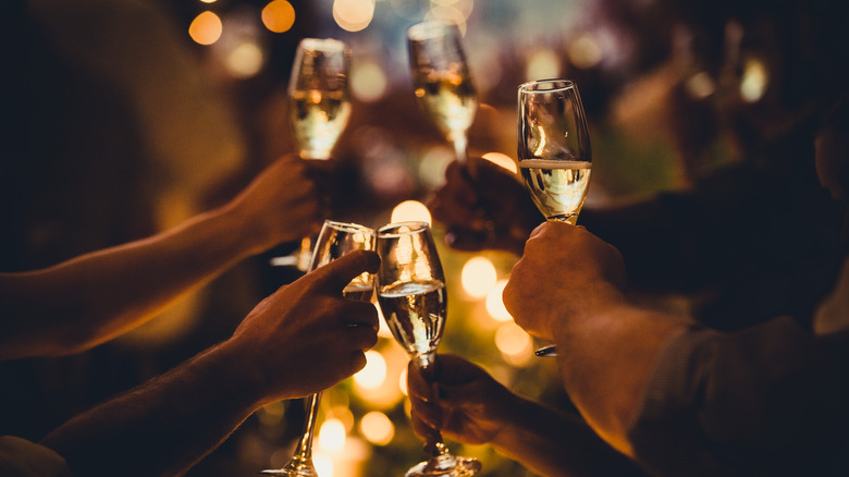 people drinking New Year champagne 