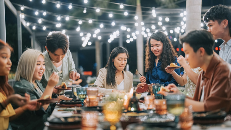 People eating dinner together