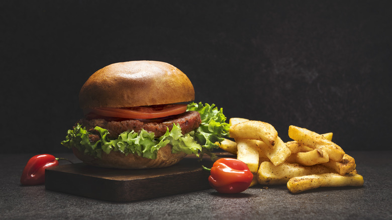A hamburger with fries