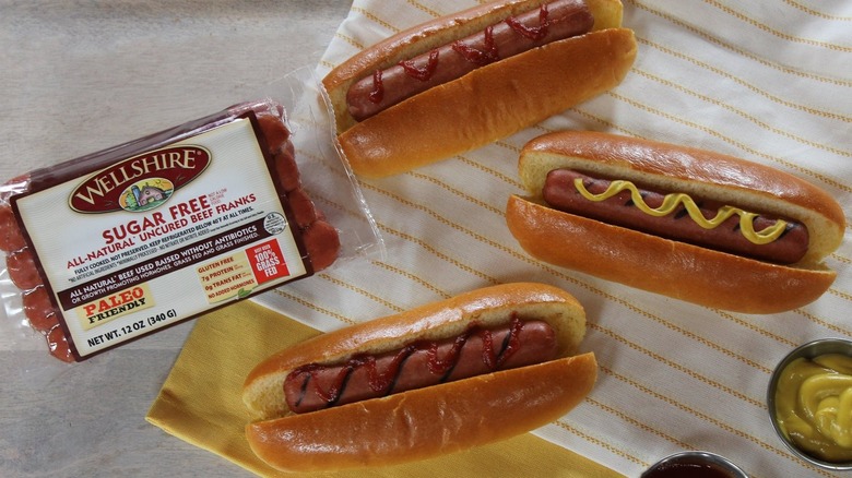 Three hot dogs with package of Wellshire Farms Sugar Free Beef Franks