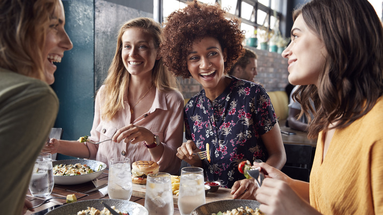 Four women at dinner