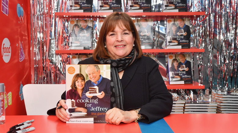 Ina Garten holding book