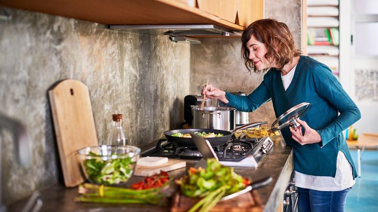Woman stirring a pot