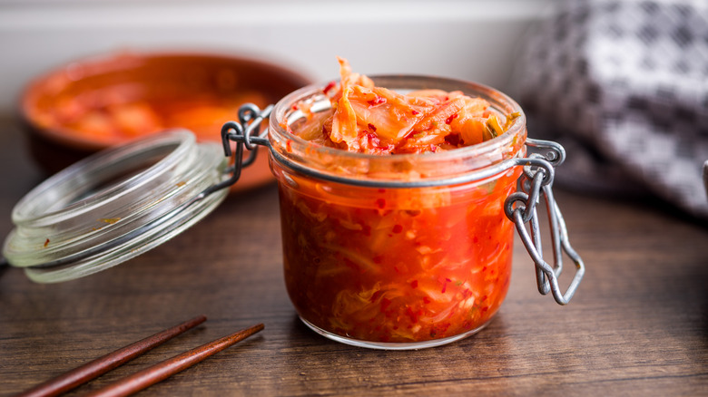 An open jat of kimchi