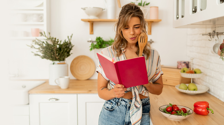 woman reading recipe