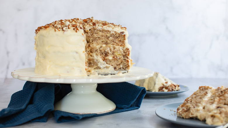 Three-tier hummingbird cake on stand