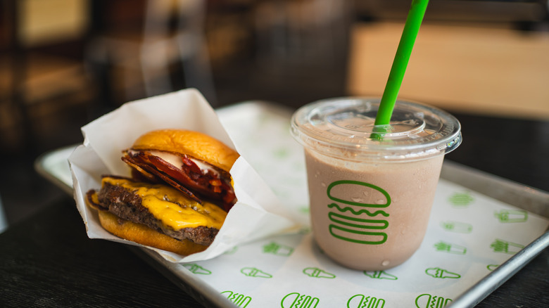 Burger and milkshake from Shake Shack on a tray