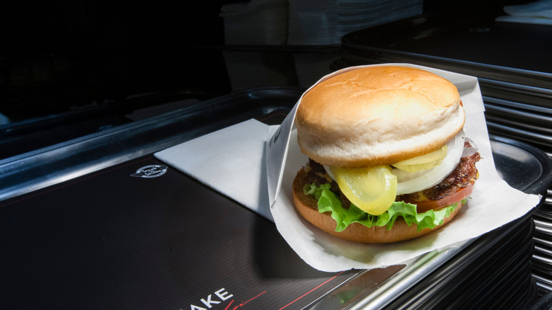 Steakburger from Steak n' Shake with pickles, tomatoes, lettuce, and onion