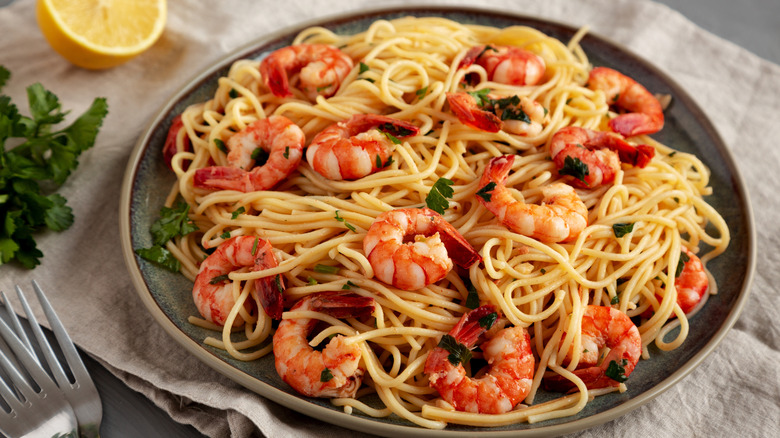 Homemade Cooked Garlic Shrimp Scampi on a Plate, side view