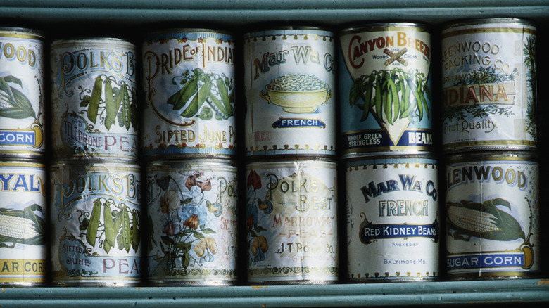 Shelves stocked with canned goods
