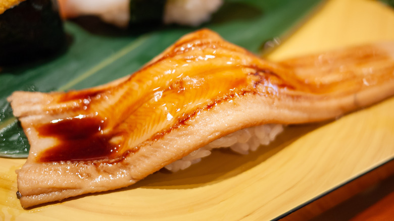 A close-up of anago sushi