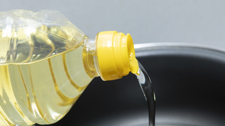 cooking oil poured into pot