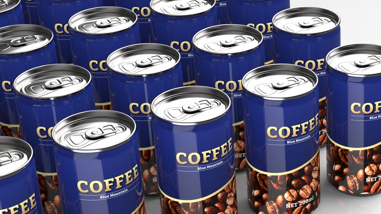Cans of coffee on a white background