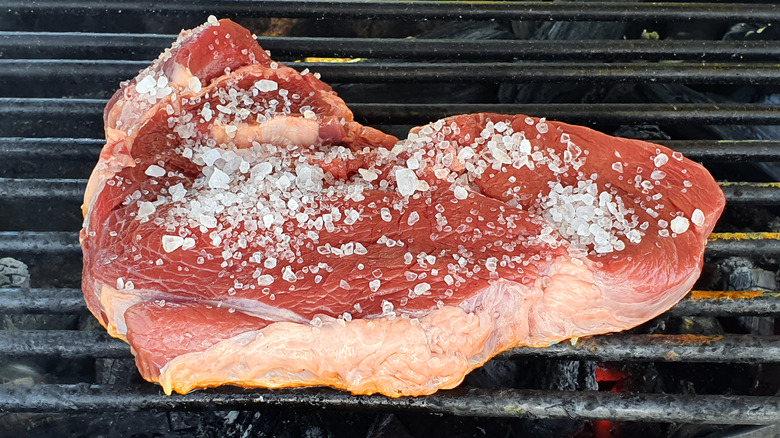 Rump steak covered with coarse salt