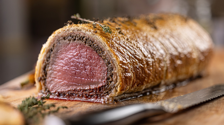 Beef Wellington on a cutting board
