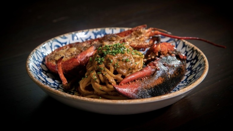A close-up of a plate of lobster à l'Américaine