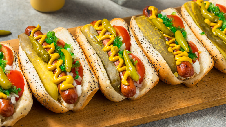 lineup of Chicago style hot dogs
