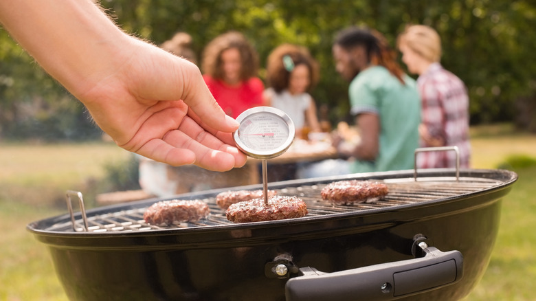 meat thermometer in burger