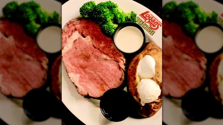 A plate of steak, baked potato and brocolli from Logan's Roadhouse